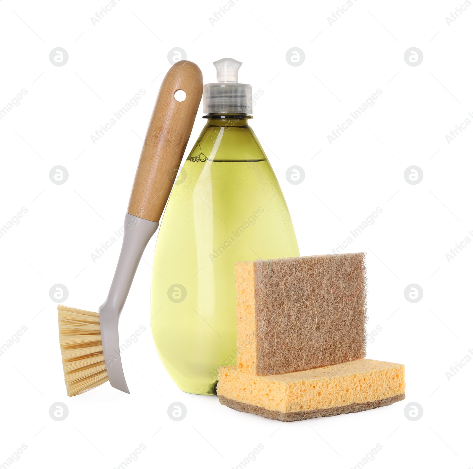 Photo of Bottle of cleaning product, brush and sponges isolated on white