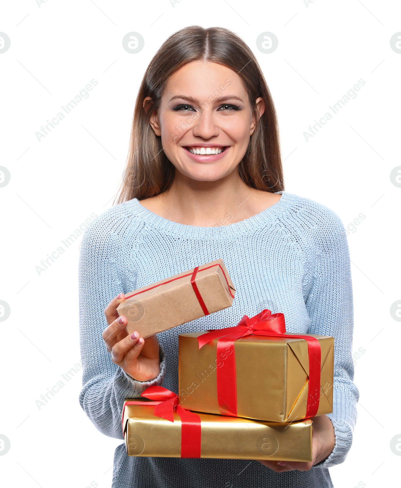 Photo of Young woman with Christmas gifts on white background