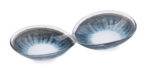 Photo of Two blue contact lenses isolated on white
