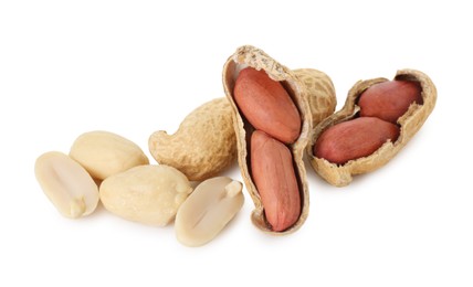 Photo of Fresh peanuts isolated on white. Healthy snack