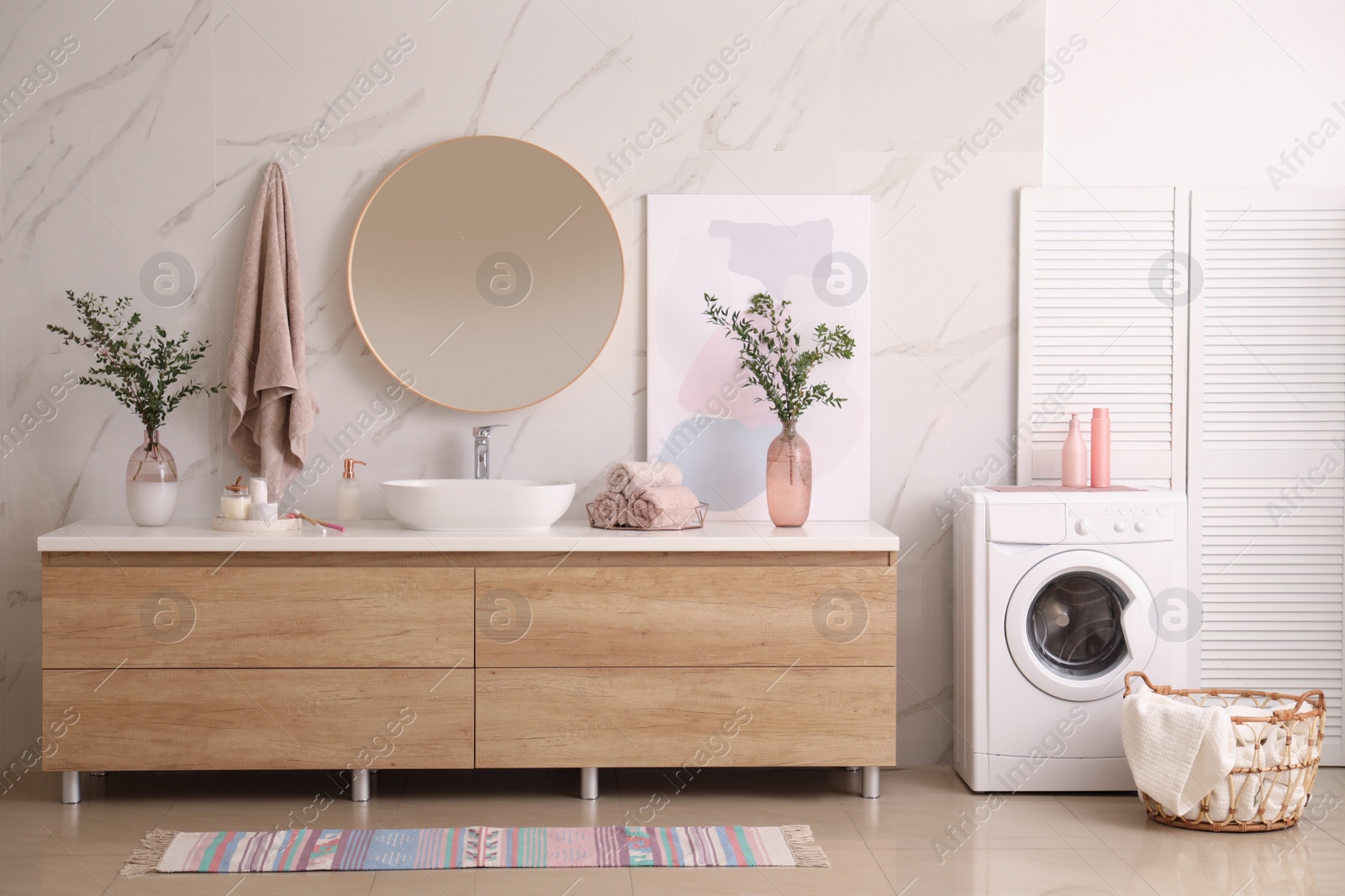 Photo of Modern bathroom interior with stylish mirror and vessel sink