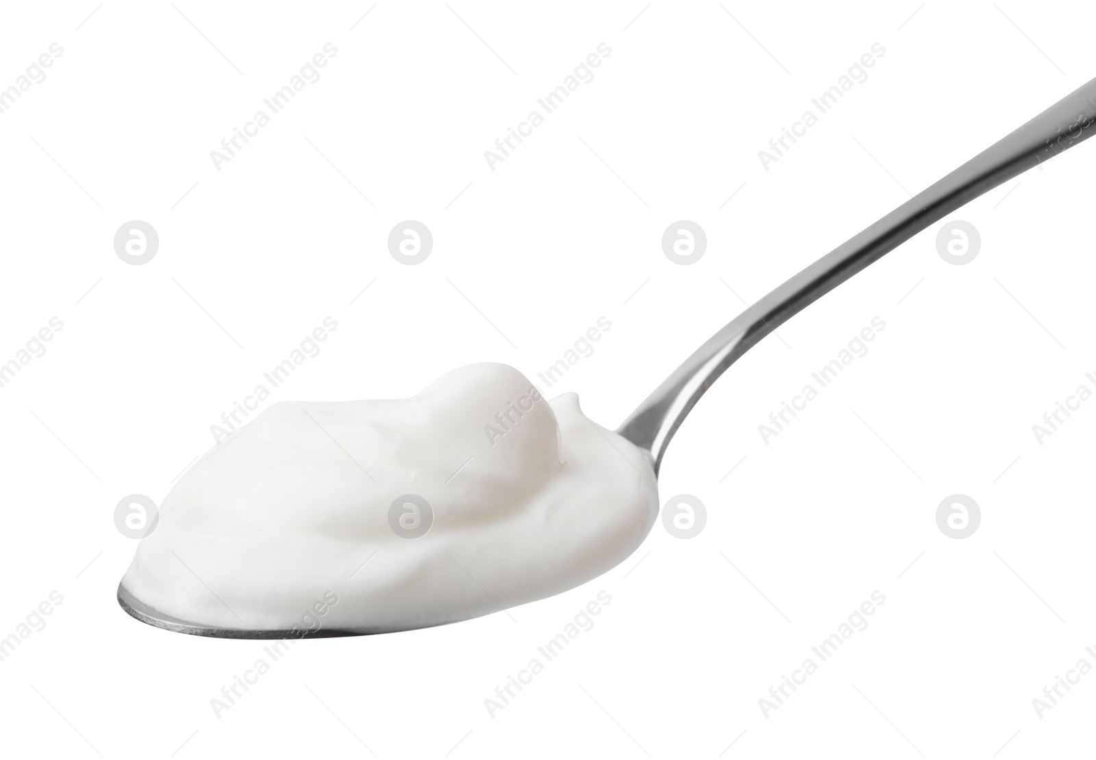 Photo of Delicious natural yogurt in spoon isolated on white