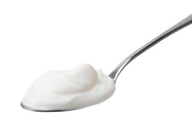 Delicious natural yogurt in spoon isolated on white