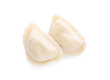 Delicious dumplings (varenyky) with tasty filling on white background, top view