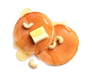 Photo of Tasty pancakes with butter and honey on white background