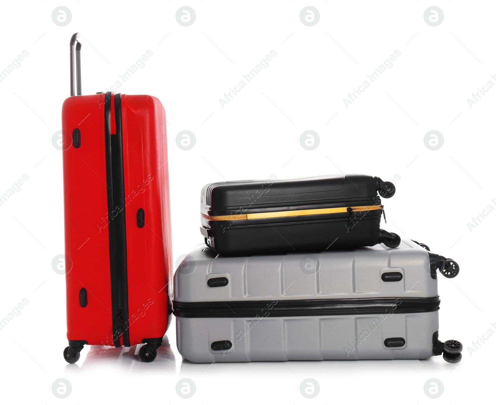 Photo of Modern suitcases for travelling on white background