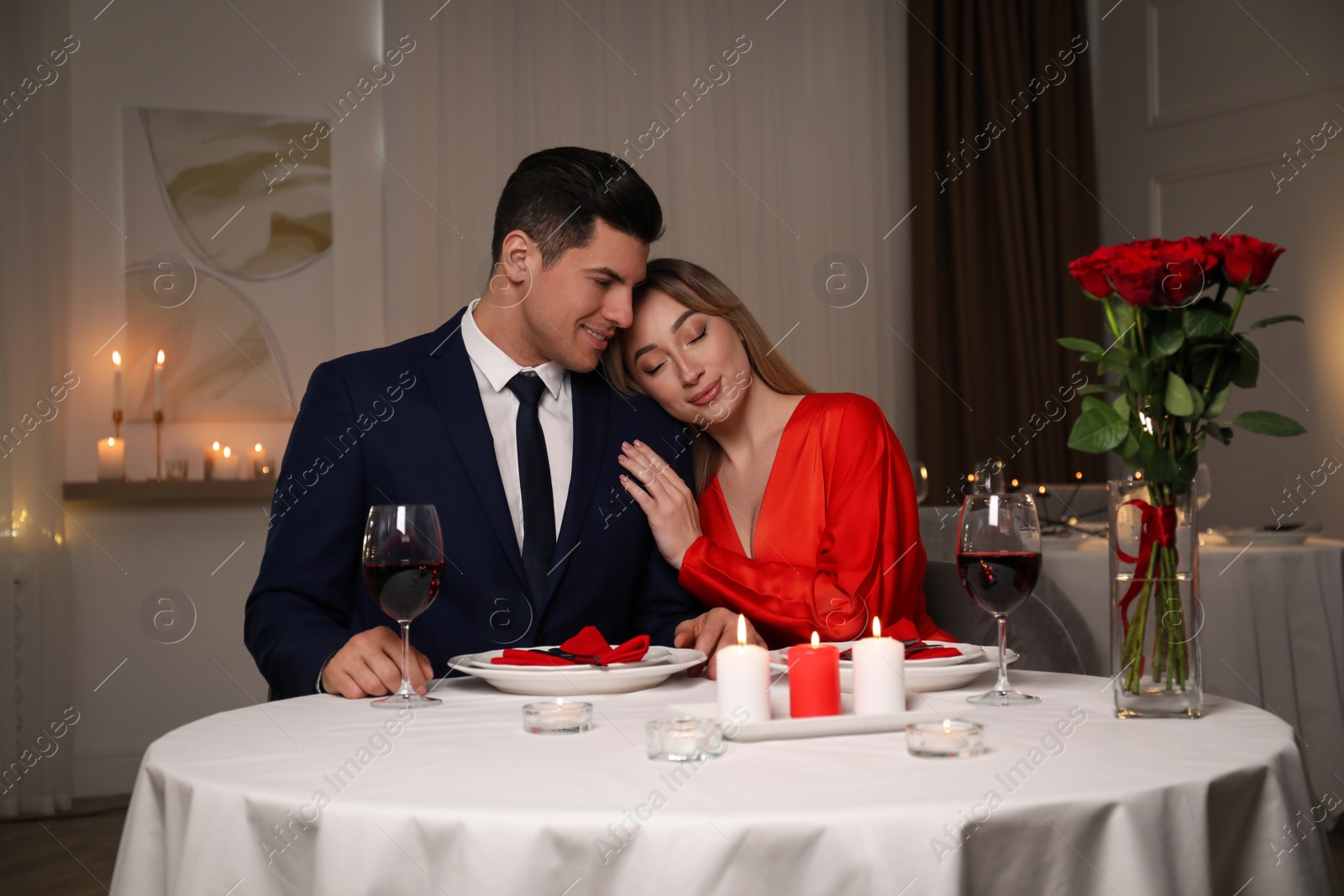 Photo of Lovely couple having romantic dinner in restaurant