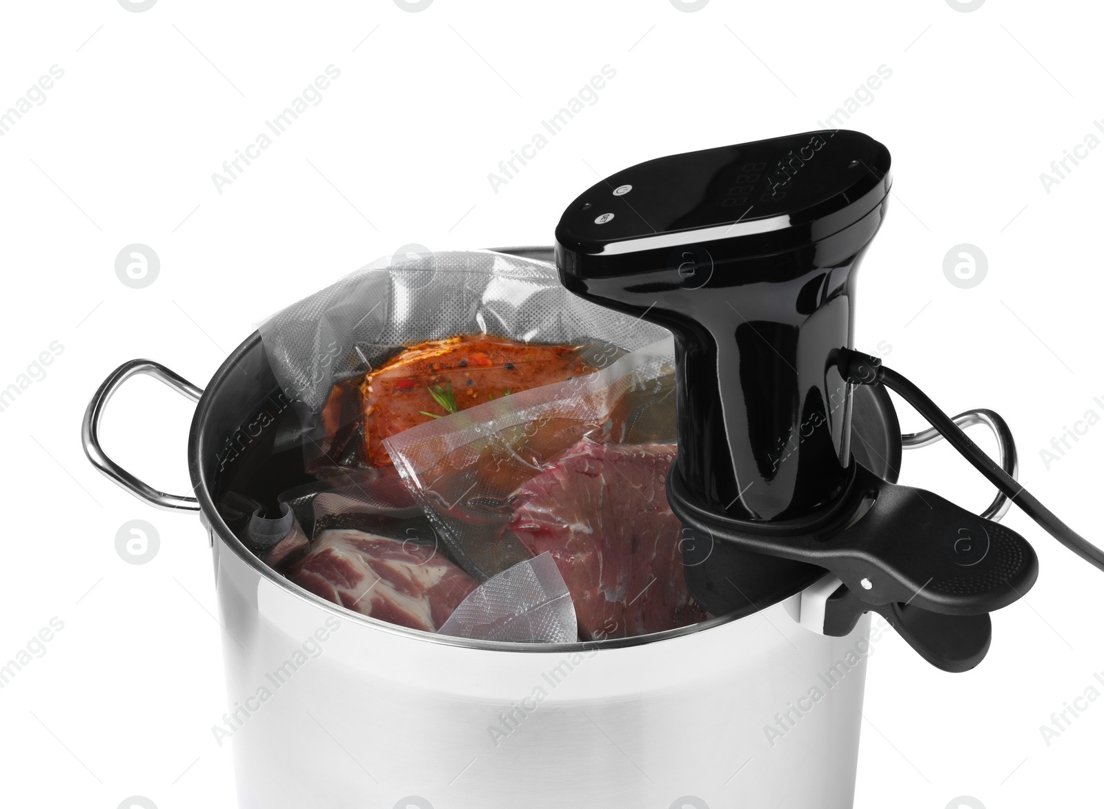 Photo of Thermal immersion circulator and meat in pot on white background. Vacuum packing for sous vide cooking