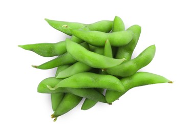 Raw green edamame pods on white background, top view