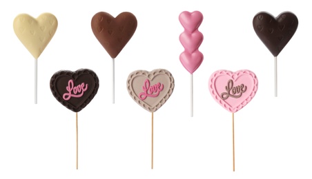 Image of Set with heart shaped lollipops made of chocolate on white background, banner design