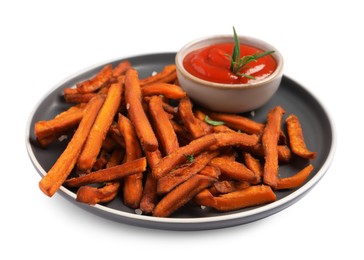 Plate with delicious sweet potato fries and sauce on white background