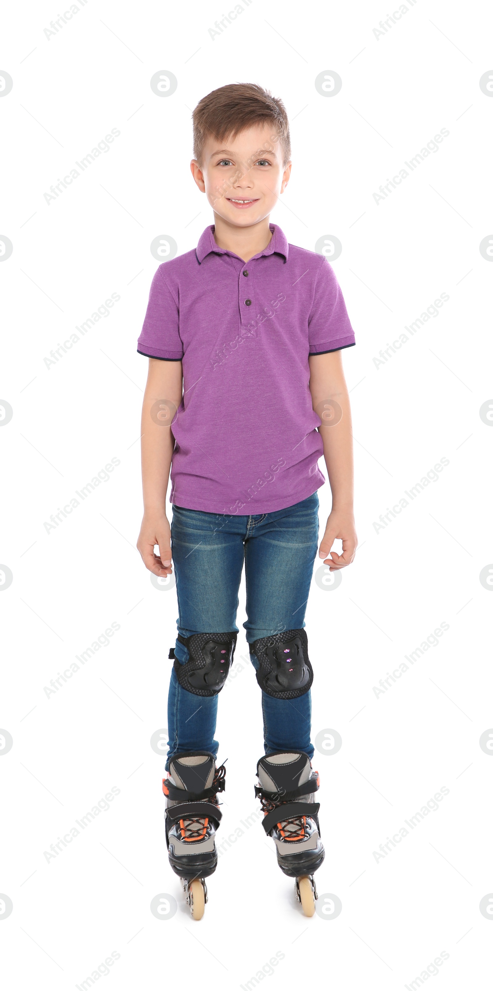 Photo of Full length portrait of boy with inline roller skates on white background