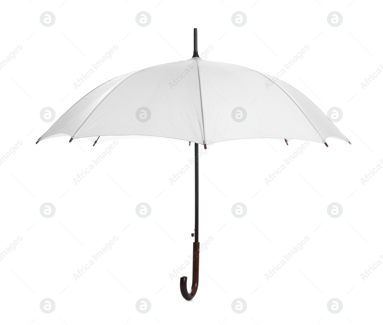 Photo of One open straight umbrella isolated on white