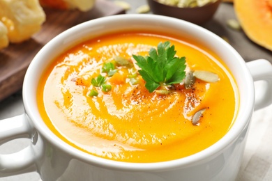 Bowl with tasty pumpkin soup, closeup view