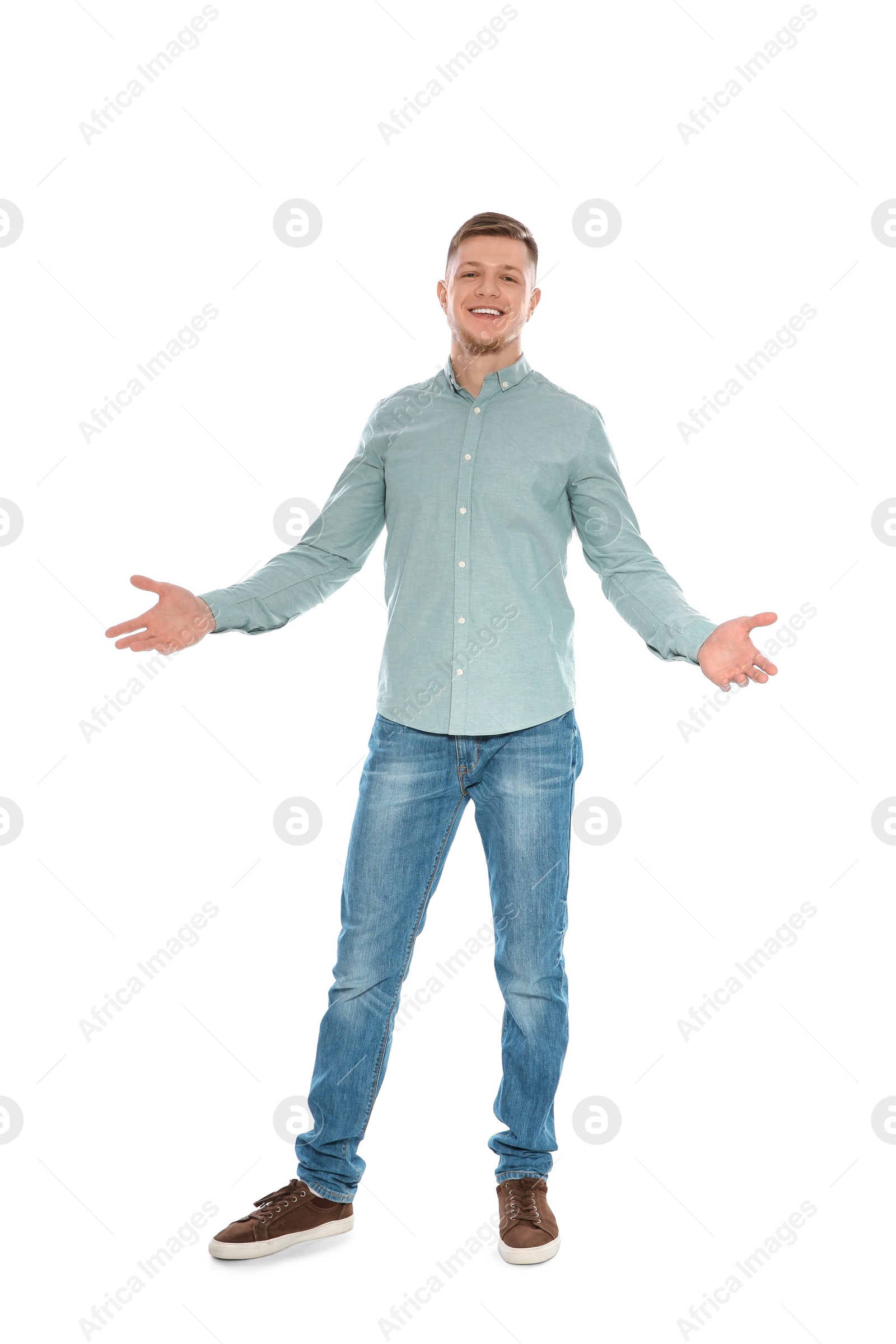 Photo of Full length portrait of handsome young man on white background