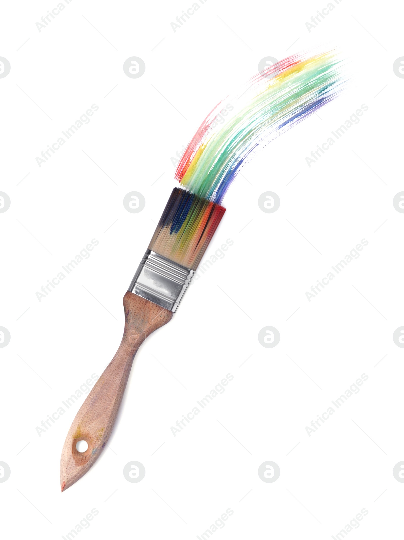 Photo of Rainbow paint stroke and brush on white background, top view