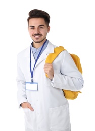 Young medical student with backpack on white background