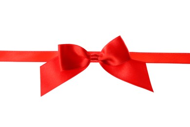 Red ribbon with bow on white background. Festive decoration