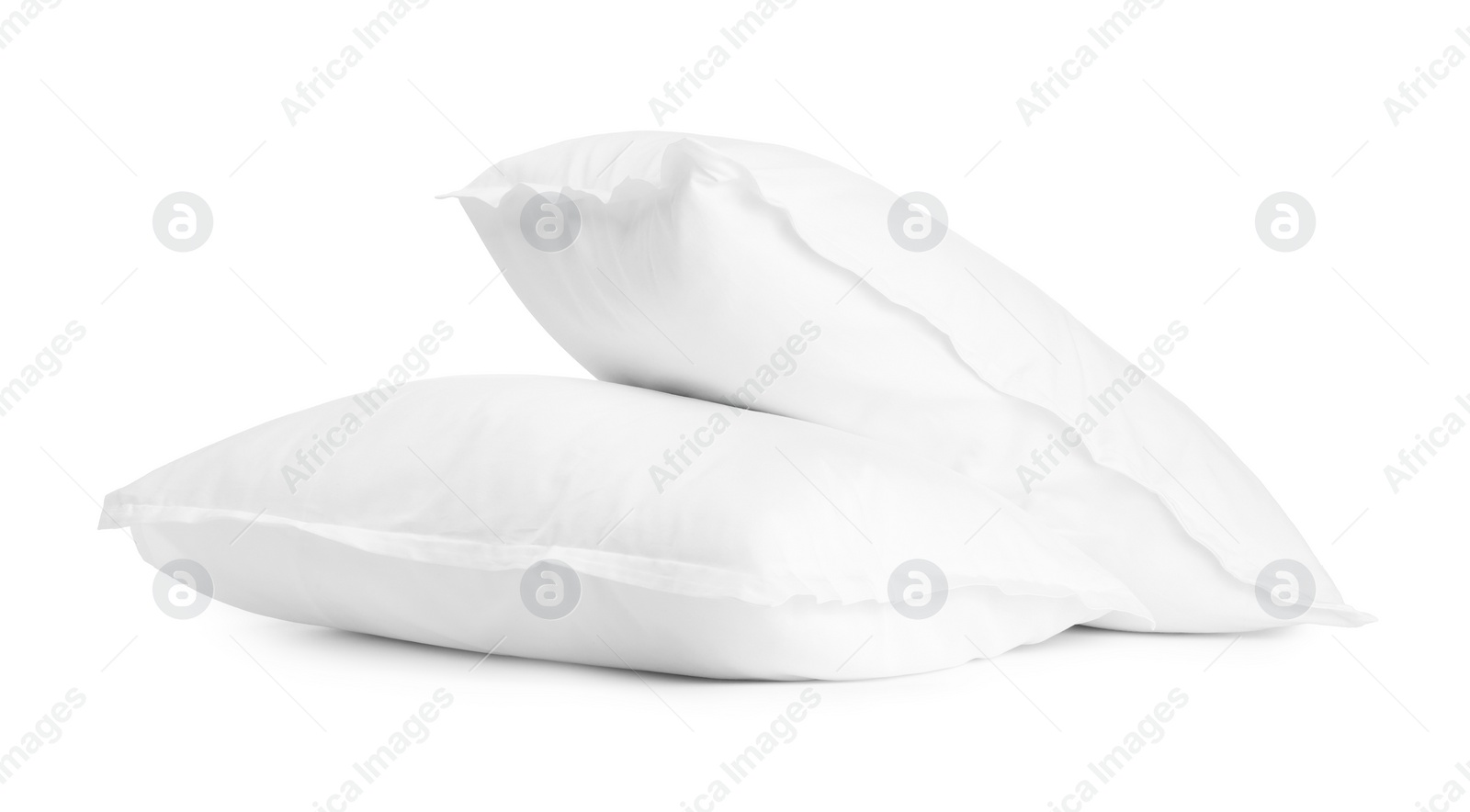 Photo of Two new soft pillows isolated on white