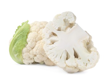 Photo of Cut and whole cauliflowers on white background