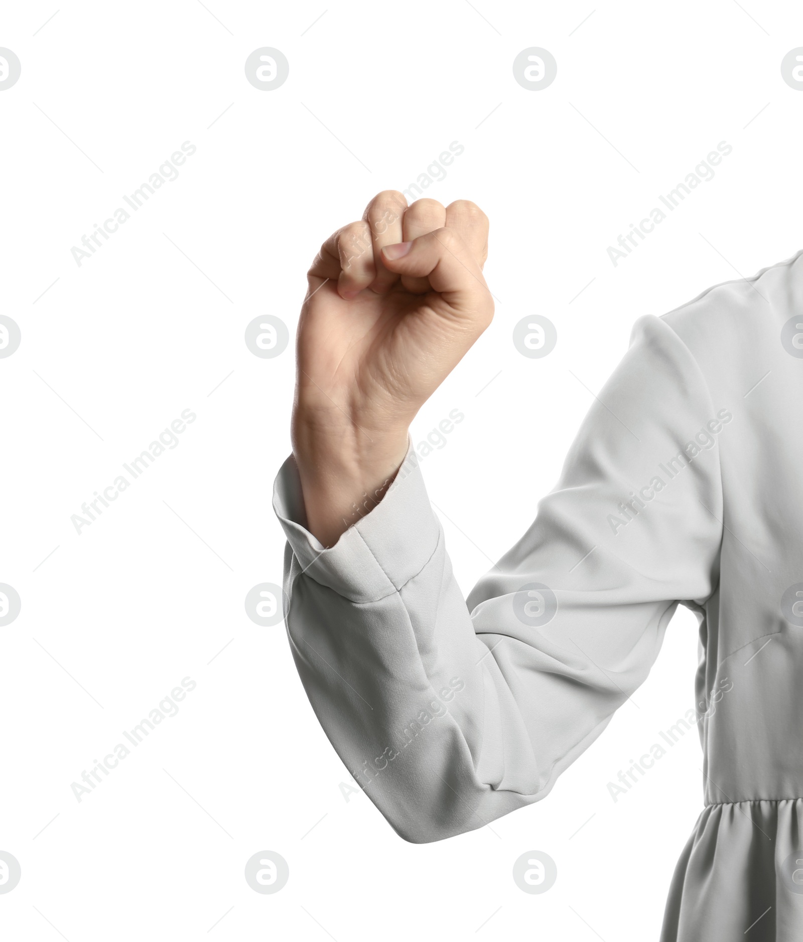 Photo of Young woman showing clenched fist on white background