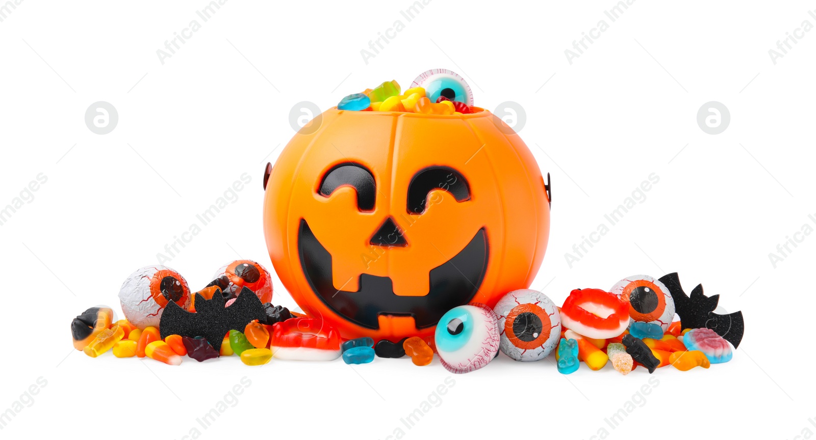 Photo of Halloween trick or treat bucket with different sweets on white background