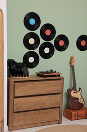 Photo of Living room interior decorated with vinyl records