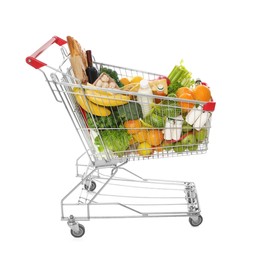 Photo of Shopping cart full of groceries on white background