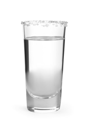 Photo of Mexican Tequila in shot glass with salt isolated on white