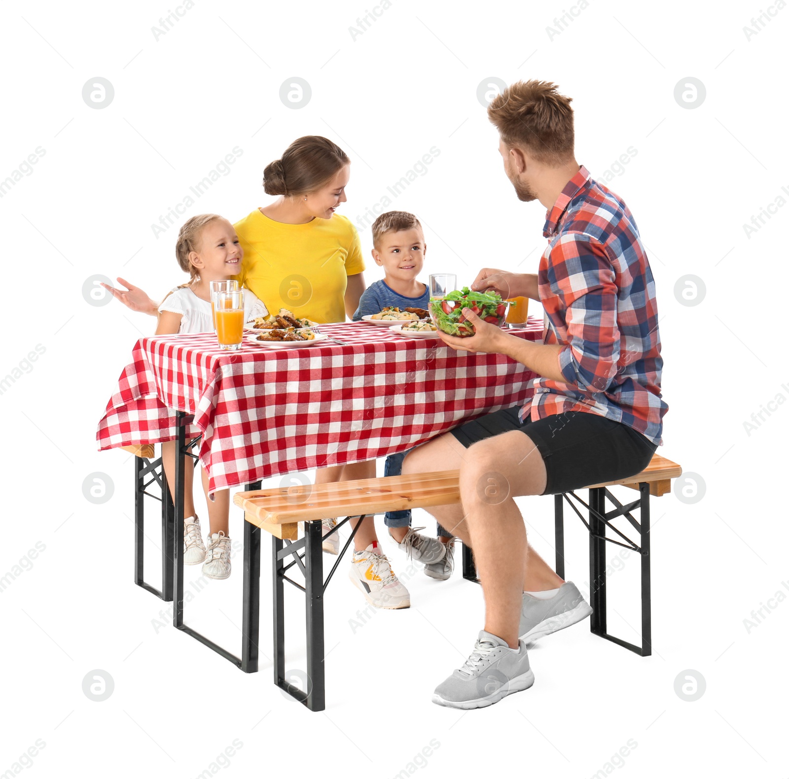 Photo of Happy family having picnic at table on white background