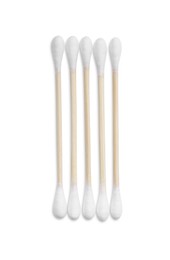 Wooden cotton buds on white background, top view