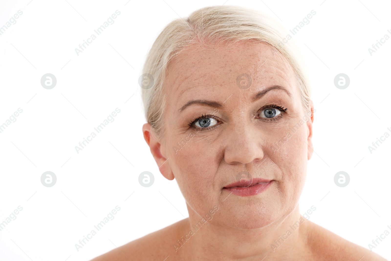 Photo of Portrait of beautiful older woman on white background