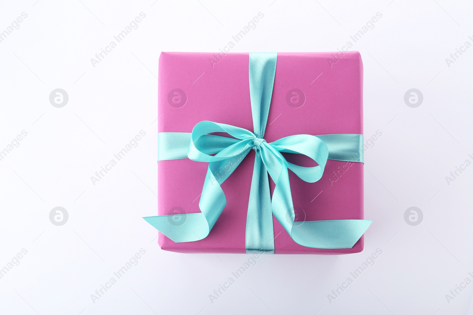 Photo of Beautiful gift box with ribbon on white background