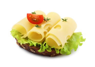 Photo of Tasty sandwich with slices of fresh cheese, tomato, thyme and lettuce isolated on white