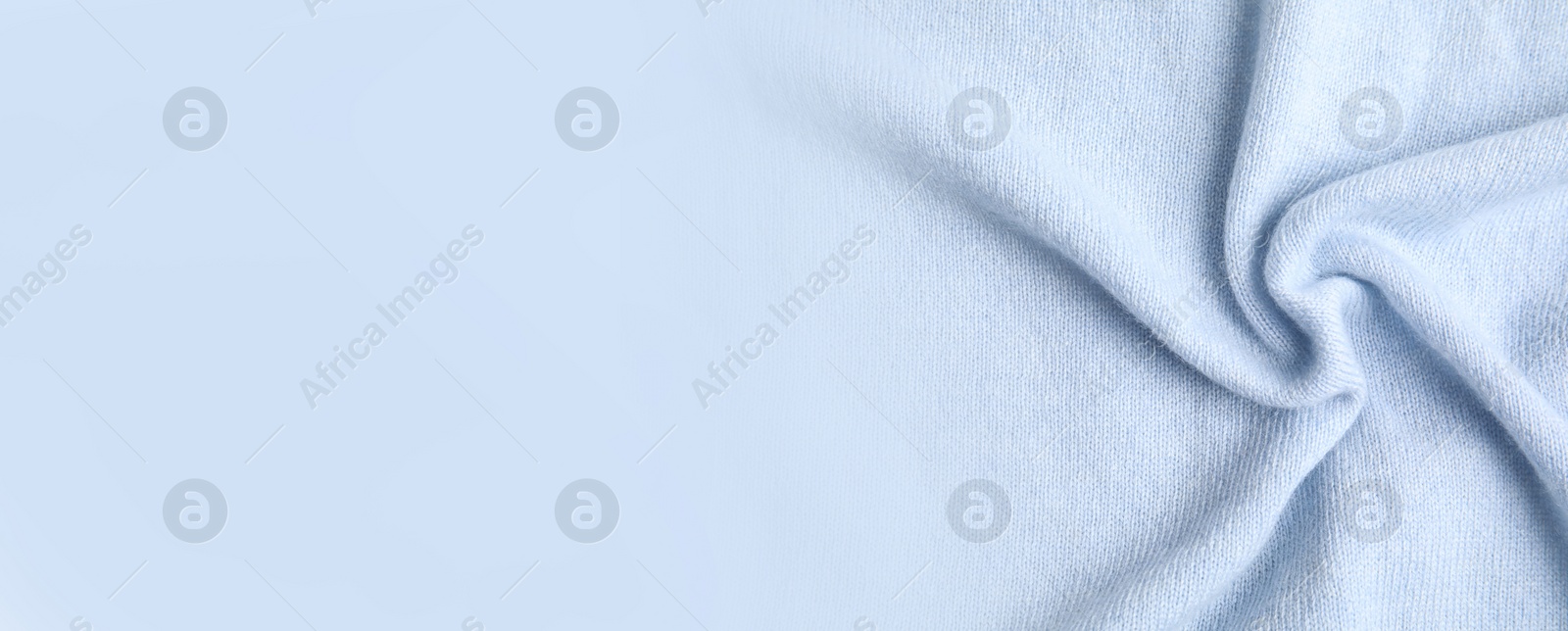 Image of Warm cashmere fabric as background, closeup view with space for text. Banner design