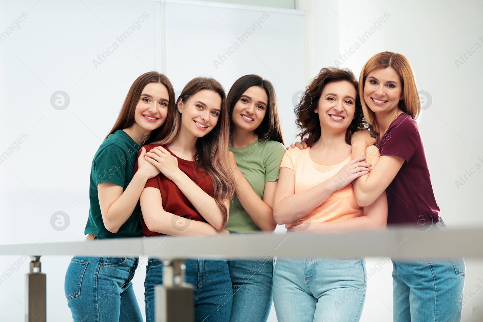 Photo of Portrait of happy ladies indoors. Women power concept