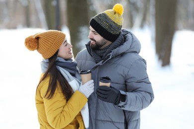 Photo of Beautiful young couple enjoying winter day outdoors