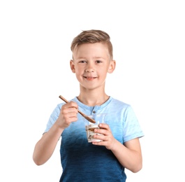 Little boy with yogurt on white background