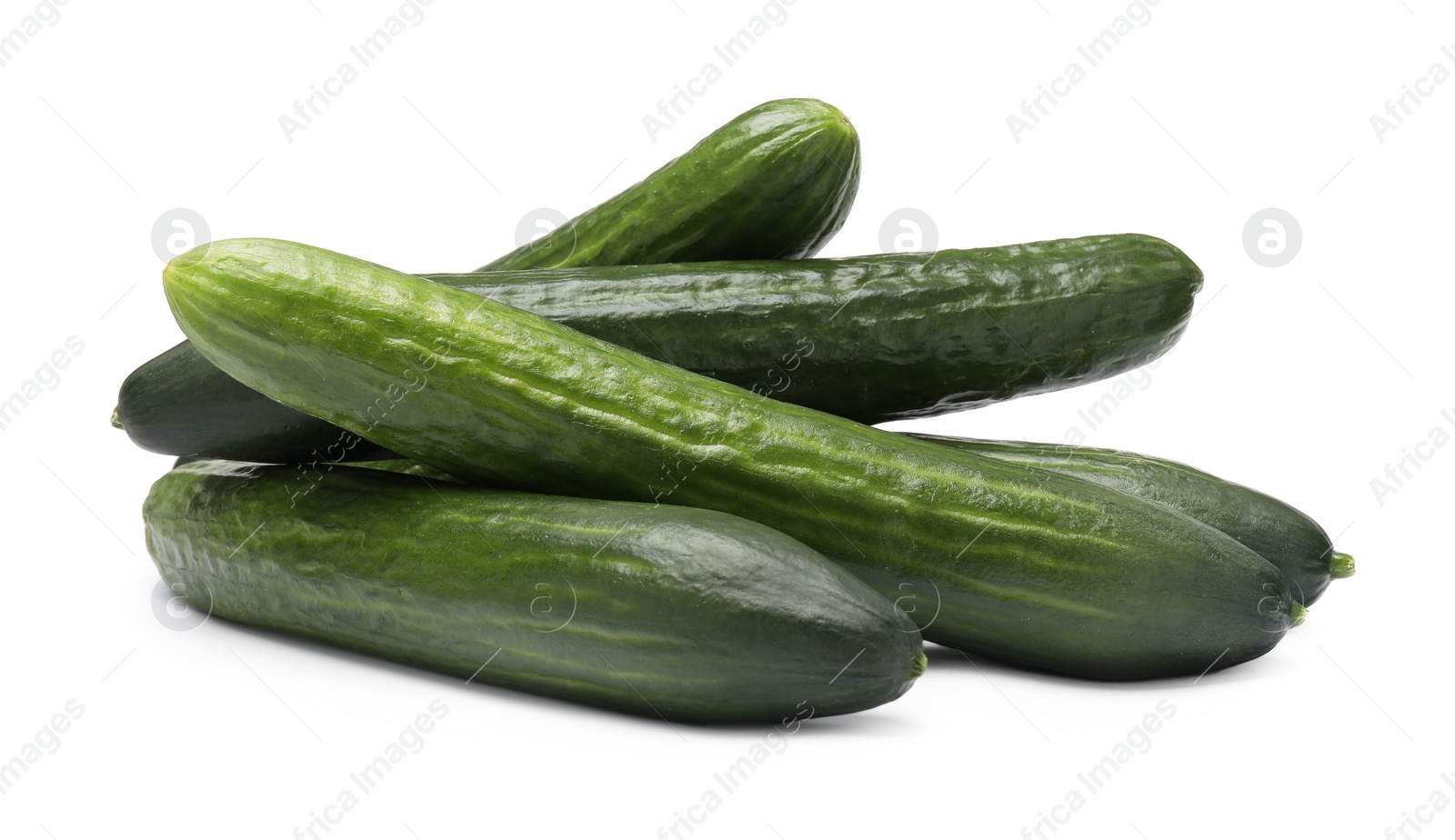 Photo of Many long fresh cucumbers isolated on white