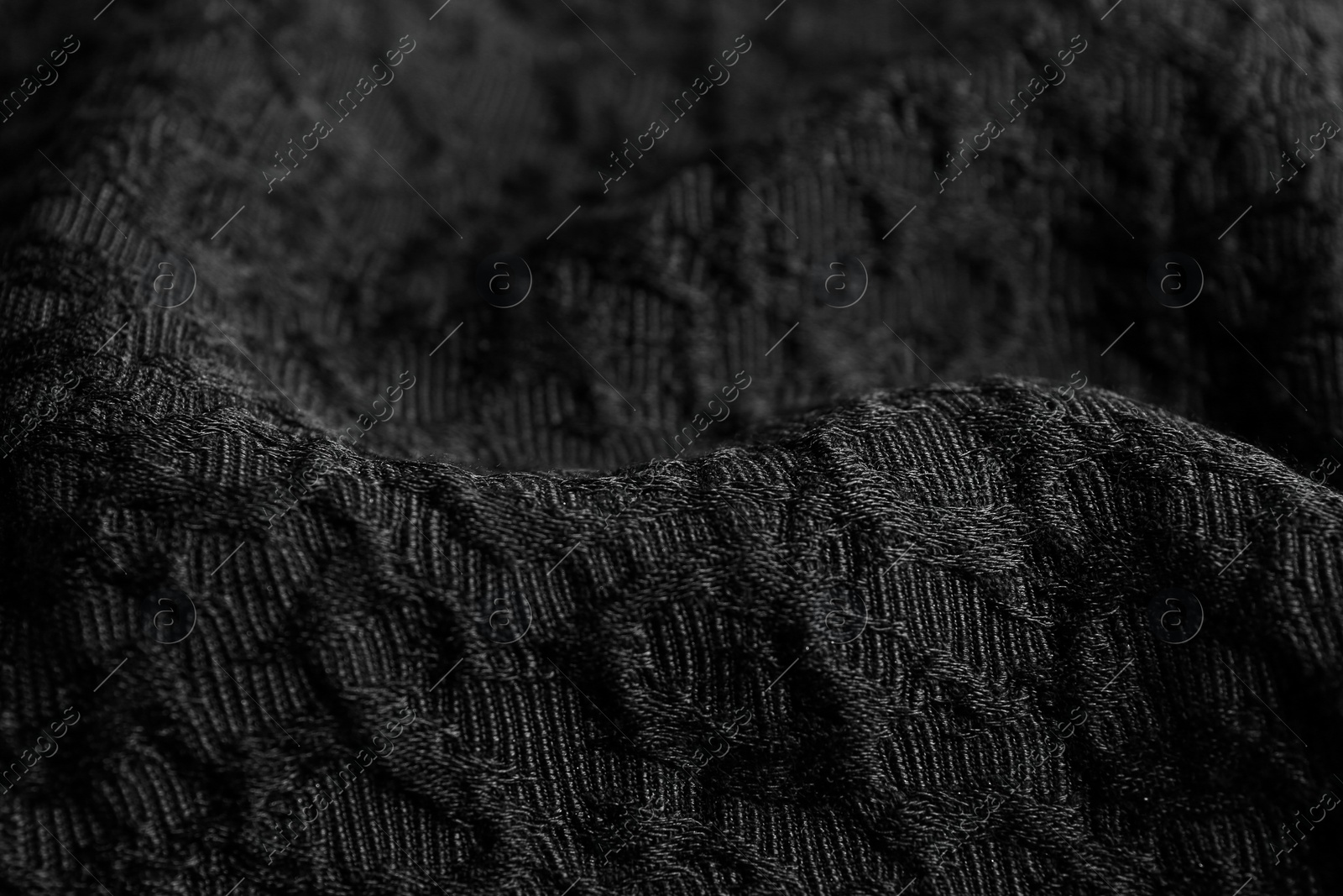 Photo of Textured dark fabric as background, closeup view