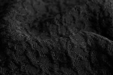 Photo of Textured dark fabric as background, closeup view