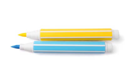 Bright markers isolated on white, top view
