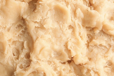 Photo of Fresh raw dough as background, closeup