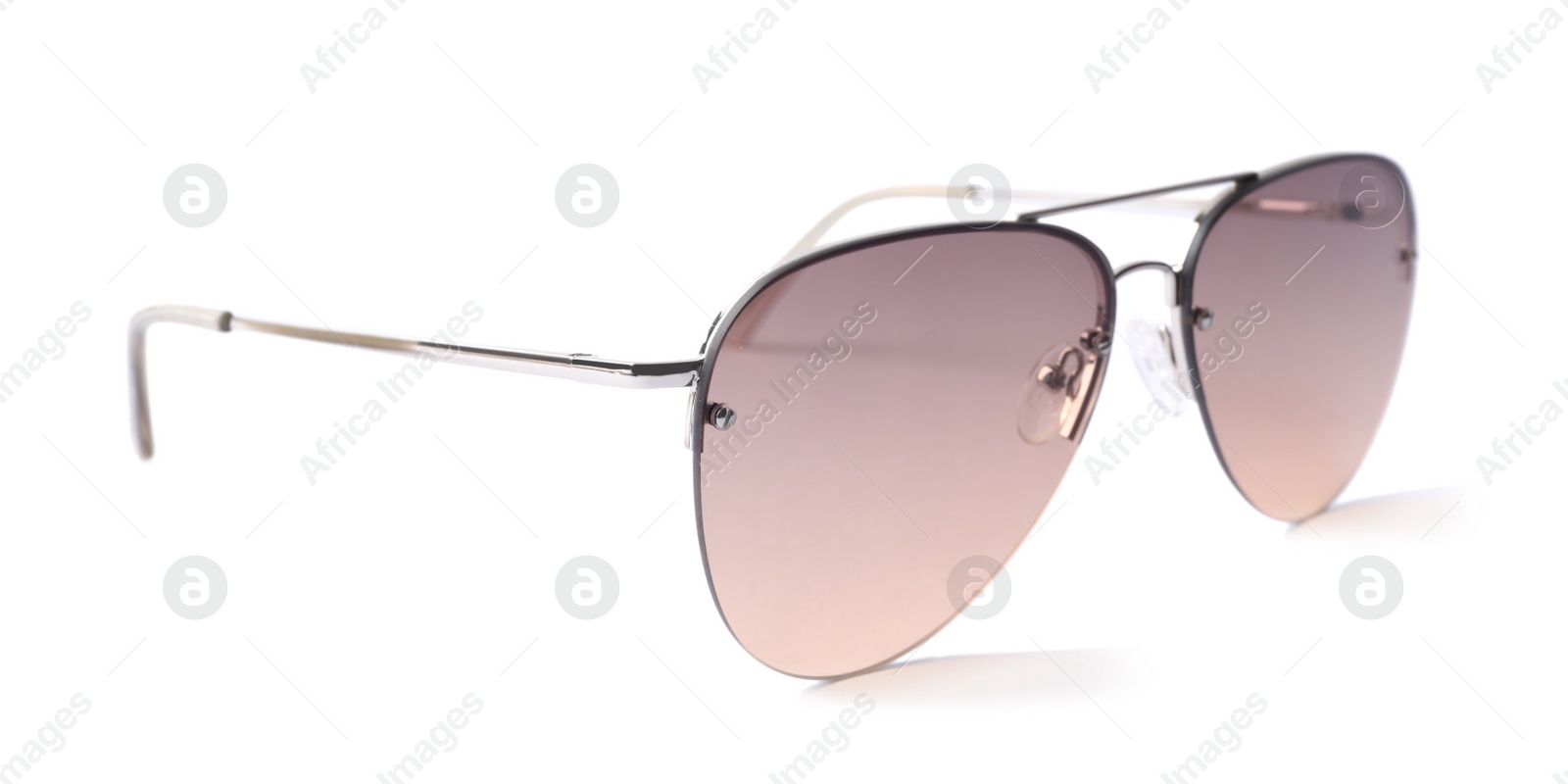 Photo of New stylish aviator sunglasses isolated on white