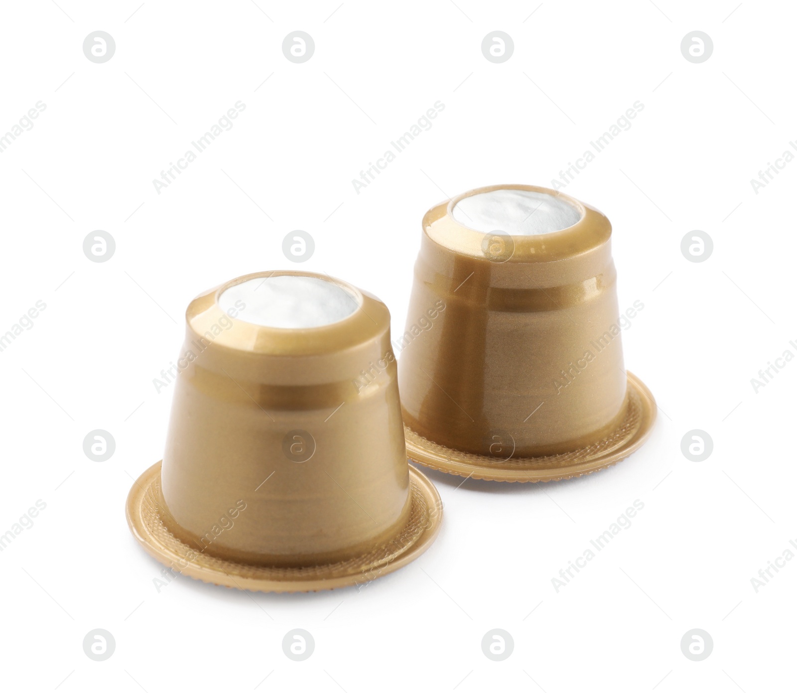 Photo of Two plastic coffee capsules isolated on white