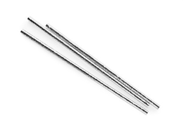 Photo of Silver plastic cocktail straws on white background, top view