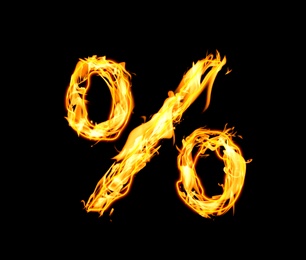 Image of Bright flaming percent symbol on black background