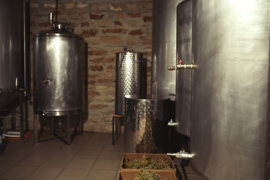 Photo of Steel tanks for wine fermentation at factory