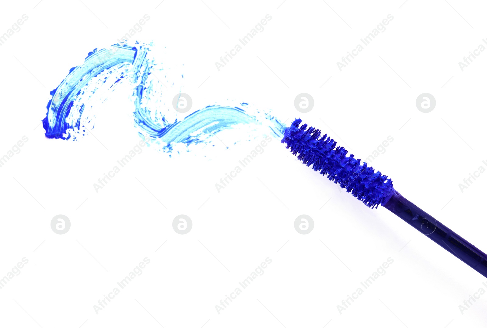Photo of Applicator and blue mascara smear on white background, top view