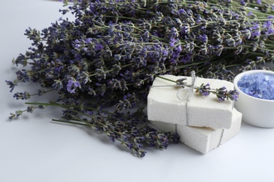 Hand made soap bars with lavender flowers on white background